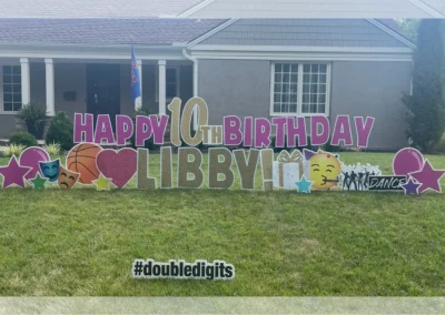 YL Kansas City sign - "Happy 10th Birthday Libby!" Pink and gold letters, stage performance and basketball symbols, stars, balloons and hearts